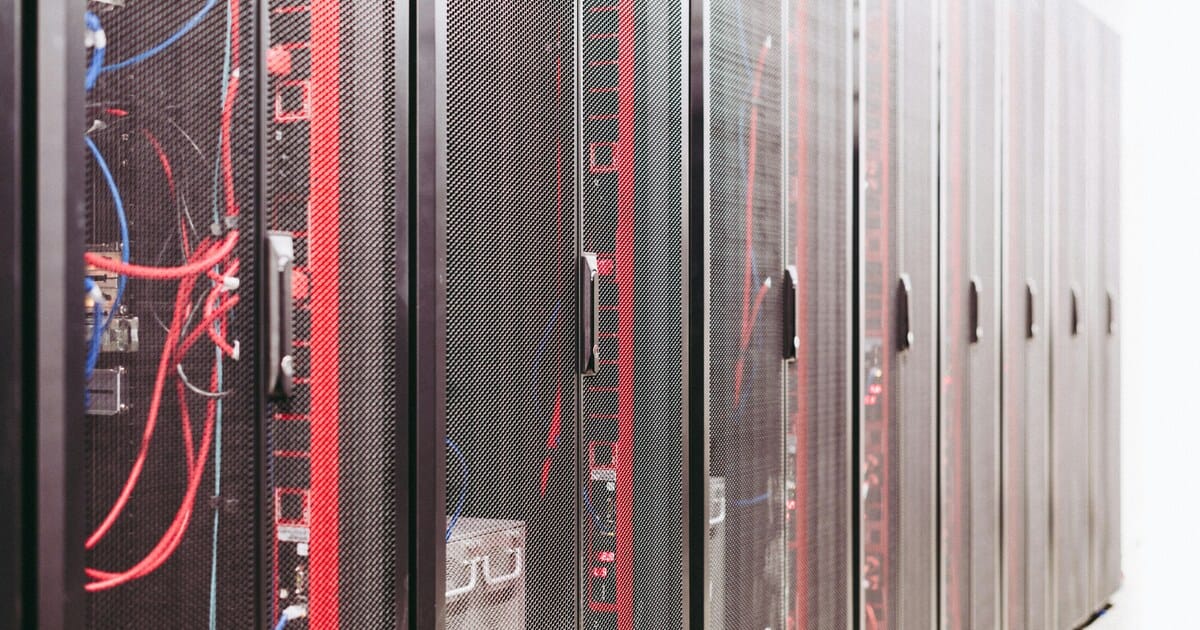 Server racks in a data center representing infrastructure and execution risk.